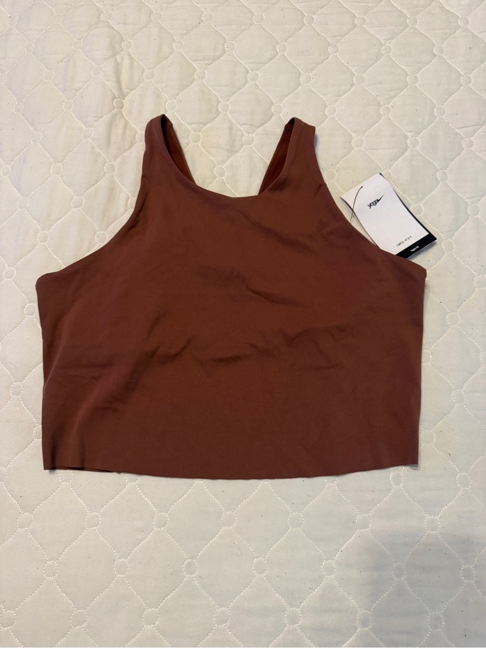 Nike Dri-FIT Yoga Cropped Tank in Rust Brown